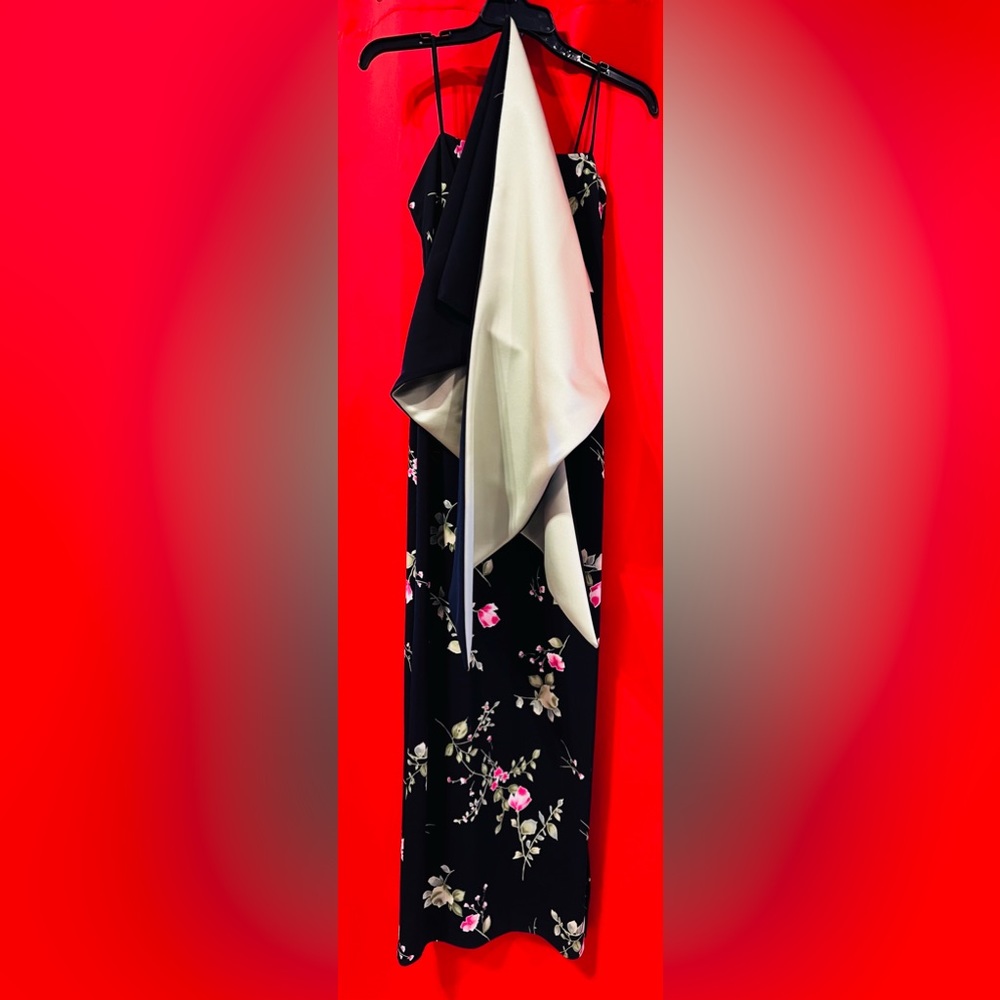 Black spaghetti, strapped with pink flowers and scarf